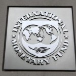 The International Monetary Fund (IMF) logo is seen at the IMF headquarters building during the 2013 Spring Meeting of the International Monetary Fund and World Bank in Washington, April 18, 2013. REUTERS/Yuri Gripas