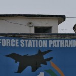 An Indian security personnel stands guard on a building at the Indian Air Force (IAF) base at Pathankot in Punjab, January 5, 2016. REUTERS/Mukesh Gupta