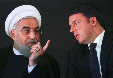 Iran President Hassan Rouhani (L) talks with Italian Prime Minister Matteo Renzi at the Campidoglio palace in Rome, Italy, January 25, 2016.  REUTERS/Alessandro Bianchi