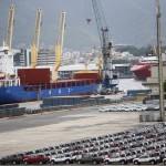 Hundreds of cars stand in the port of Rio de Janeiro, Brazil December 1, 2015.  REUTERS/Ricardo Moraes