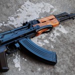 guns_AK47_woman_matola