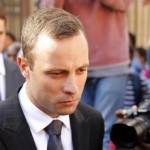 Olympic and Paralympic track star Oscar Pistorius reacts at the end of his trial at the North Gauteng High Court in Pretoria April 10, 2014. REUTERS/Siphiwe Sibeko