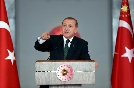 Turkish President Tayyip Erdogan makes a speech during a meeting in Ankara, Turkey February 17, 2016, in this handout photo provided by the Presidential Palace. REUTERS/Murat Cetinmuhurdar/Presidential Palace/Handout via Reuters