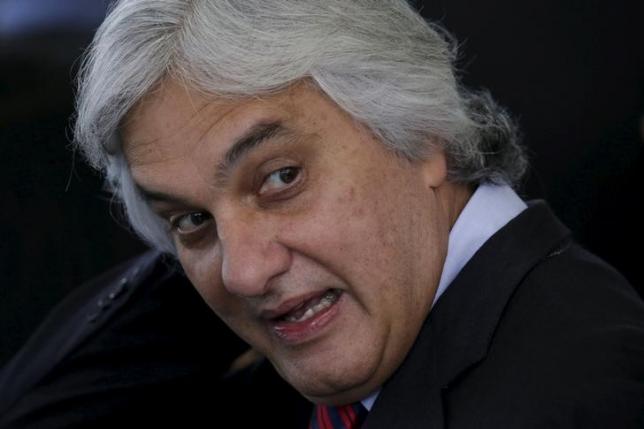Brazil's Senator Delcidio Amaral reacts during a ceremony to reappoint Brazil's Prosecutor-General Rodrigo Janot to the position of Prosecutor-General of the Republic at the Planalto Palace in Brasilia, Brazil, September 17, 2015. REUTERS / Ueslei Marcelino