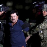Joaquin "El Chapo" Guzman is escorted by soldiers during a presentation at the hangar belonging to the office of the Attorney General in Mexico City, Mexico January 8, 2016.  REUTERS/Edgard Garrido