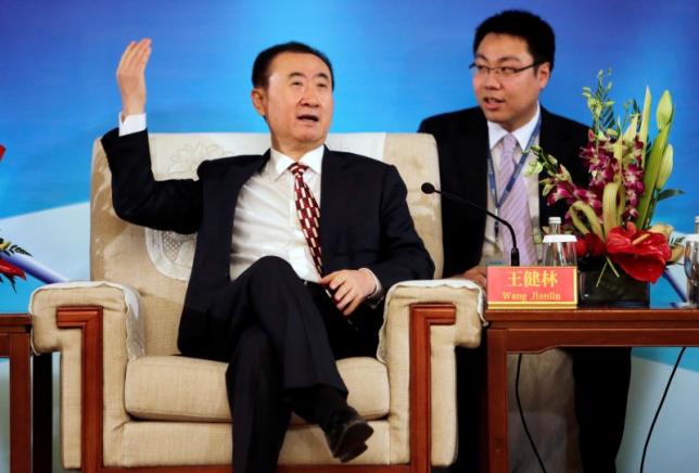Wang Jianlin, chairman of Dalian Wanda Group, gestures as he speaks ahead of a signing ceremony with Spanish soccer champions Atletico Madrid in Beijing, January 21, 2015. REUTERS/Jason Lee
