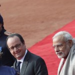 French President Francois Hollande and India's Prime Minister Narendra Modi (R) walk during his ceremonial reception at the forecourt of India's Rashtrapati Bhavan presidential palace in New Delhi, India, January 25, 2016. REUTERS/Adnan Abidi