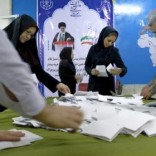 Election officials count ballot papers after the close of polling stations during elections for the parliament and a leadership body called the Assembly of Experts, which has the power to appoint and dismiss the supreme leader, in Tehran February 26, 2016. REUTERS/Raheb Homavandi/TIMA
