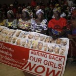 Parents of the Chibok girls hold a "Bring Back Our Girls" banner during their meeting with Nigeria's President Muhammadu Buhari at the presidential villa in Abuja, Nigeria, January 14, 2016. REUTERS/Afolabi Sotunde