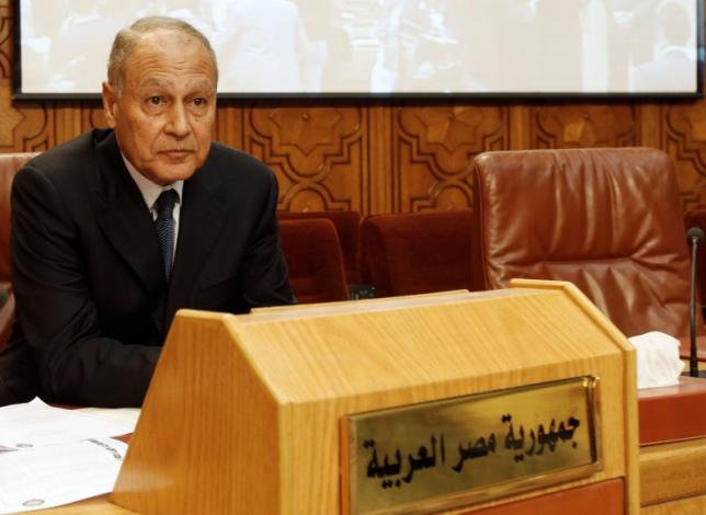 Ahmed Aboul Gheit sits beside an unoccupied seat for the Libyan foreign minister, at the opening of an emergency meeting among the Arab League foreign ministers, held to discuss issues about Libya, at the headquarters in Cairo  March 2, 2011.  REUTERS/Amr Abdallah Dalsh