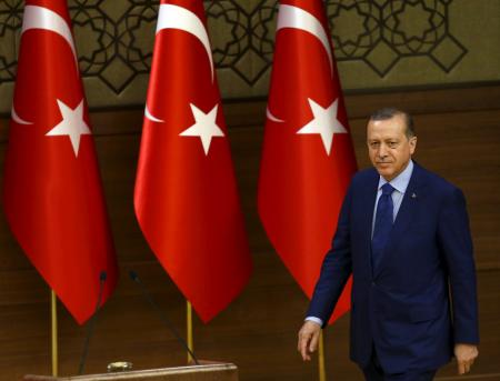Turkish President Tayyip Erdogan arrives a meeting with mukhtars at the Presidential Palace in Ankara, Turkey, March 16, 2016.  REUTERS/Umit Bektas