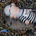 An inflatable doll known as "Pixuleco" of Brazil's former President Luiz Inacio Lula da Silva is seen during a protest against Rousseff, part of nationwide protests calling for her impeachment, in Sao Paulo, Brazil, March 13, 2016. REUTERS/Paulo Whitaker