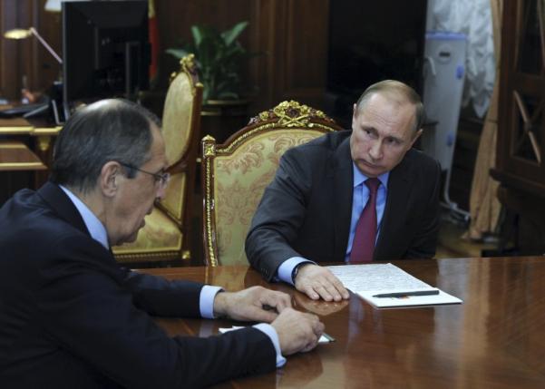 Russian President Vladimir Putin meets Foreign Minister Sergei Lavrov at the Kremlin in Moscow, Russia, March 14, 2016.  REUTERS/Mikhail Klimentyev/Sputnik/Kremlin ATTENTION EDITORS - THIS IMAGE HAS BEEN SUPPLIED BY A THIRD PARTY. IT IS DISTRIBUTED, EXACTLY AS RECEIVED BY REUTERS, AS A SERVICE TO CLIENTS.      TPX IMAGES OF THE DAY