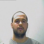 A man, whom Interpol said is named Khalid El Bakraoui, is seen in this undated photo issued by Interpol on their website and obtained March 23, 2016, after he was suspected of involvement in the Brussels airport and metro attack. REUTERS/Interpol/Handout via Reuters