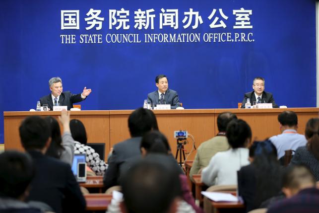 Xu Dazhe (C), head of China National Space Administration attends a news conference in Beijing, China, April 22, 2016. China Daily/via REUTERS ATTENTION.