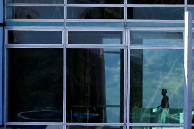 Brazil's President Dilma Rousseff is seen after a meeting with deputies of the allied parties at the Alvorada Palace in Brasilia, Brazil, April 14, 2016. REUTERS/Ueslei Marcelino