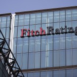 The headquarters of Fitch Ratings Ltd. stands in the Canary Wharf business and shopping district in London, U.K., on Friday, July 12, 2013. Recent data suggest Britain's economic recovery is gaining momentum after a return to growth in the first quarter. Photographer: Simon Dawson/Bloomberg via Getty Images