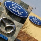 The logos of Ford and Mazda Motor Co are seen at the company's assembly plant in Pretoria July 18, 2014.   REUTERS/Siphiwe Sibeko