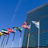 united nations building in nyc and flag poles