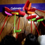Ministerial staff use brooms to scrub the office door of the Transparency Minister Fabiano Silveira demanding his resignation, in Brasilia, Brazil, Monday, May 30, 2016. A recording TV Globo broadcast late Sunday shows Silveira criticizing Operation Car Wash, a wide-ranging corruption probe of the state oil company Petrobras that has implicated numerous leading Brazilian politicians and businessmen. Protesters in Brazil use brooms as a representation to sweep away corruption. (AP Photo/Eraldo Peres)