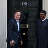 Nigeria's President-elect Muhammadu Buhari (R) departs after meeting with Britain's Prime Minister David Cameron at Downing Street in London, England, May 23, 2015. REUTERS/Neil Hall