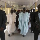 Governor of Borno state Kashim Shettima (C) leaves a hospital that is currently under construction in Maiduguri May 22, 2014.  REUTERS/Joe Penney