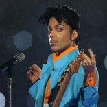 Prince performs during the halftime show of the NFL's Super Bowl XLI football game between the Chicago Bears and the Indianapolis Colts in Miami, Florida, U.S. February 4, 2007. REUTERS/Mike Blake/Files