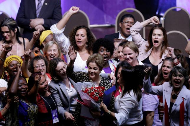 Brazil's President Dilma Rousseff (C) greets supporters during the opening ceremony of the National Policy Conference for Women in Brasilia, Brazil, May 10, 2016. REUTERS/Ueslei Marcelino