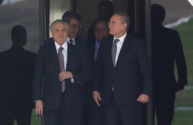Brazil's Vice President Michel Temer (L) talks with President of the Brazilian Senate Renan Calheiros as he leaves the Calheiros' house in Brasilia, Brazil, May 10, 2016.  REUTERS/Paulo Whitaker