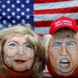 The images of U.S. Democratic presidential candidate Hillary Clinton (L) and Republican Presidential candidate Donald Trump are seen painted on decorative pumpkins created by artist John Kettman in LaSalle, Illinois, U.S., June 8, 2016.     REUTERS/Jim Young