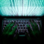 A man types on a computer keyboard in Warsaw in this February 28, 2013 illustration file picture. REUTERS/Kacper Pempel/Files