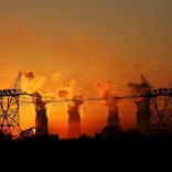 Electricity pylons are seen in front of the cooling towers at the Lethabo Thermal Power Station,an Eskom coal-burning power station near Sasolburg in the northern Free State province, March 2, 2016.   REUTERS/Siphiwe Sibeko