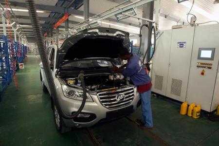 A worker assembles a car in Lifan Motors company in Dukem town outskirt of Ethiopia's capital Addis Ababa, March 18, 2016. REUTERS/Tiksa Negeri