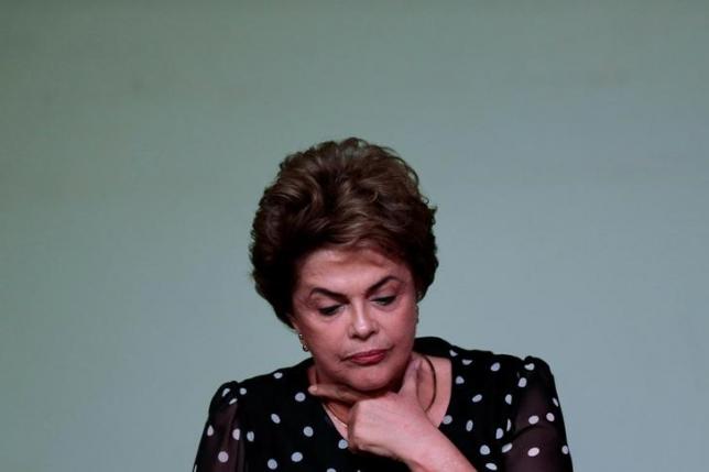 Suspended Brazilian President Dilma Rousseff gestures during the launching ceremony of the book "Resistance to the 2016 Coup," written by professors from the University of Brasilia, in Brasilia, Brazil, May 30, 2016. REUTERS/Ueslei Marcelino