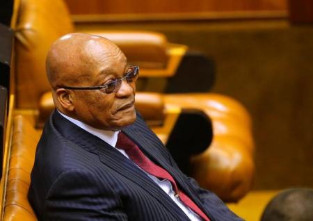 President Jacob Zuma looks on as members of Julius Malema's Economic Freedom Fighters (EFF) party raise objections before being evicted from Parliament in Cape Town, South Africa May 17, 2016.  REUTERS/Mike Hutchings/File Photo