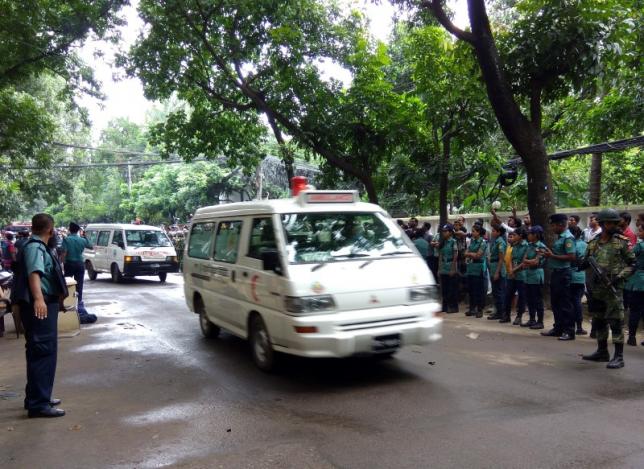An ambulance is driven on a road near the Holey Artisan restaurant after Islamist militants attacked the upscale cafe in Dhaka, Bangladesh, July 2, 2016. REUTERS/Mohammd Ponir Hossain