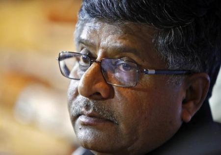 India?s Law and Telecoms Minister Ravi Shankar Prasad, pauses during a news conference in New Delhi June 17, 2014. REUTERS/Anindito Mukherjee