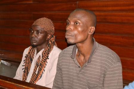 Members of secessionist group Mombasa Republican Council (MRC), Jabiri Ali Dzuya (L) and Bwana Mkuu Alwan (R) sit inside the dock at the High Court in Kenya's coastal city Mombasa, July 29, 2016, where they were sentenced to death for murdering four police officers on the eve of national elections in 2013. REUTERS/Joseph Okanga