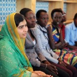 Pakistani Nobel Peace Prize laureate Malala Yousafzai talks to Burundian refugee girls at the Mahama refugee camp, Rwanda, July 14, 2016. Picture taken July 14, 2016. REUTERS/Katy Migiro