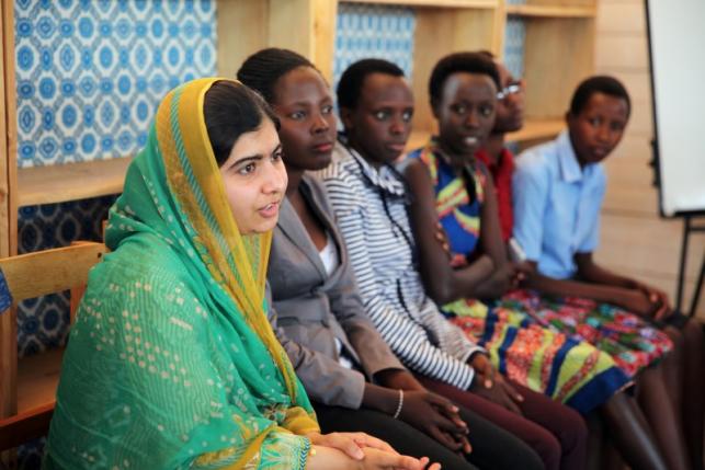 Pakistani Nobel Peace Prize laureate Malala Yousafzai talks to Burundian refugee girls at the Mahama refugee camp, Rwanda, July 14, 2016. Picture taken July 14, 2016. REUTERS/Katy Migiro