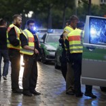 Police secure a street near to the scene of a shooting in Munich.  REUTERS/Michael Dalder