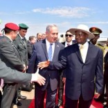 Israeli Prime Minister Benjamin Netanyahu (C) introduces members of his delegation to Uganda's President Yoweri Museveni after arriving to commemorate the 40th anniversary of Operation Entebbe at the Entebbe airport in Uganda, July 4, 2016. Presidential Press Unit/Handout via REUTERS