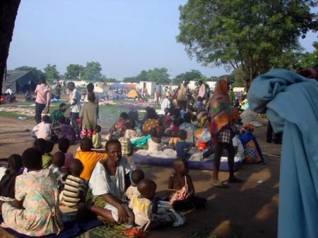 Displaced South Sudanese families sit in a camp for internally displaced people in the United Nations Mission in South Sudan (UNMISS) compound in Tomping, Juba, South Sudan, July 11, 2016.