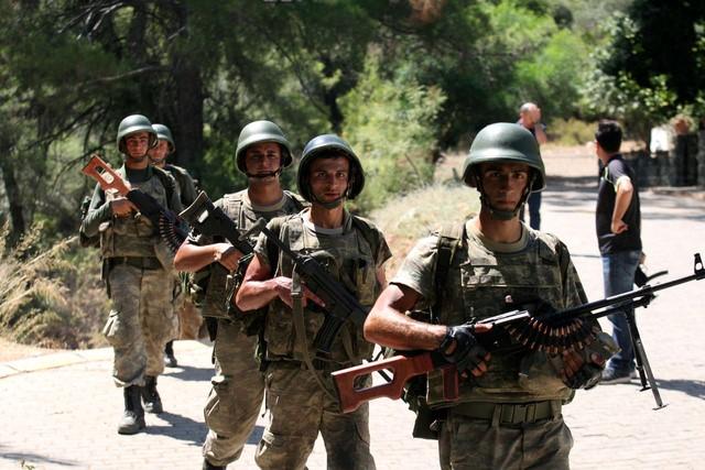 Turkish soldiers search for missing military personnel suspected of being involved in the coup attempt in Marmaris, Turkey, July 18, 2016. REUTERS/Kenan Gurbuz