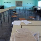 Books are seen in an empty classroom at Epworth Secondary School in Epworth near Harare, Zimbabwe, July 5, 2016. REUTERS/Philimon Bulawayo