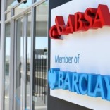 A woman uses an ATM at a branch of Barclays South African subsidiary Absa bank in Johannesburg, in this picture taken  March 6,2016. REUTERS/Siphiwe Sibeko