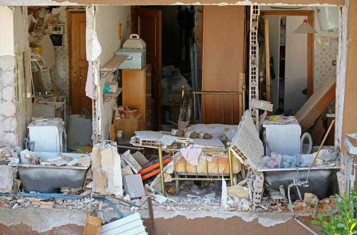 The interior of an house is seen in Amatrice, following an earthquake, central Italy, August 25, 2016. REUTERS/Stefano Rellandini