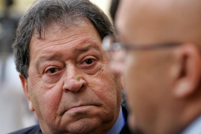 FILE PHOTO - Israeli director-general of the Water Authority and Minister of National Infrastructure Binyamin Ben-Eliezer (L) and Jordanian Minister of Water and Irrigation Raed Abu Soud are interviewed by TV stations after the opening session of The Ministerial Conference on Water at the King Hussein Convention Centre at the Dead Sea Shore near Amman December 22, 2008. REUTERS/Muhammad Hamed/File Photo