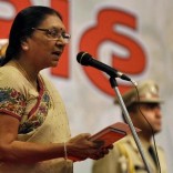 Anandiben Patel, the newly appointed chief minister of the western Indian state of Gujarat, takes her oath during a swearing-in ceremony at Gandhinagar in Gujarat May 22, 2014. REUTERS/Amit Dave