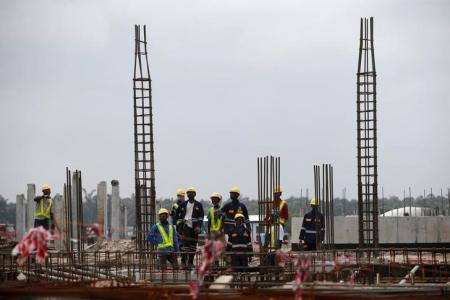 Construction workers are seen working on a site during a facility tour at the proposed Dangote oil refinery site near Akodo beach in the outskirt of Nigeria's commercial capital Lagos June 25, 2016. REUTERS/Akintunde Akinleye